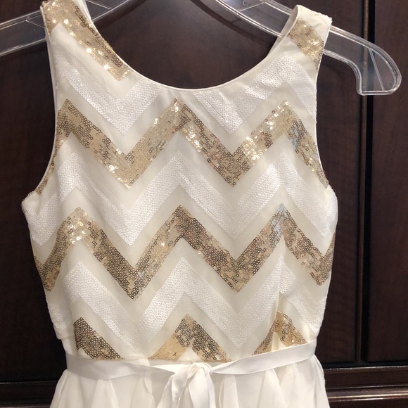 Beautiful ivory and gold sequined dress. Ruffle layers. Worn 2 x’s - Picture 2 of 5